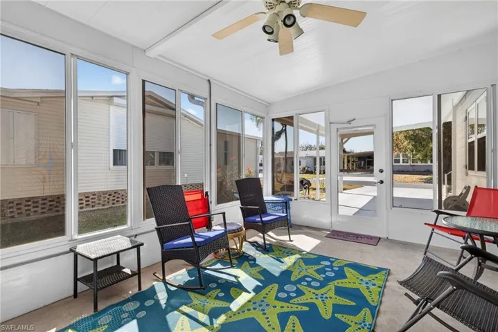 Sunroom with ceiling fan