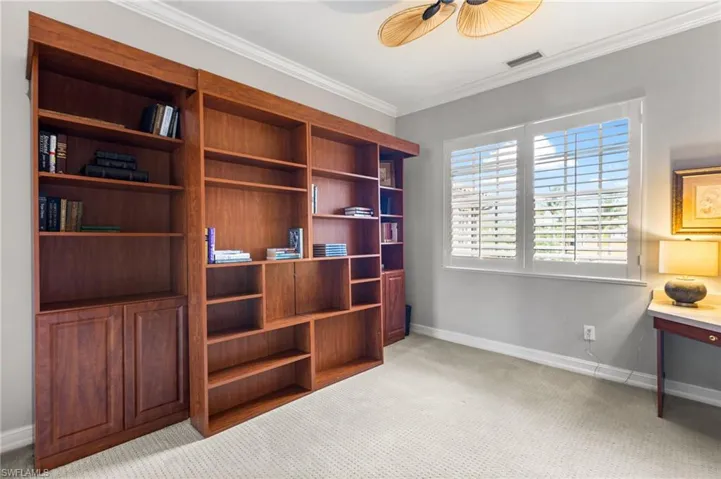 2nd bedroom is being used as an office.