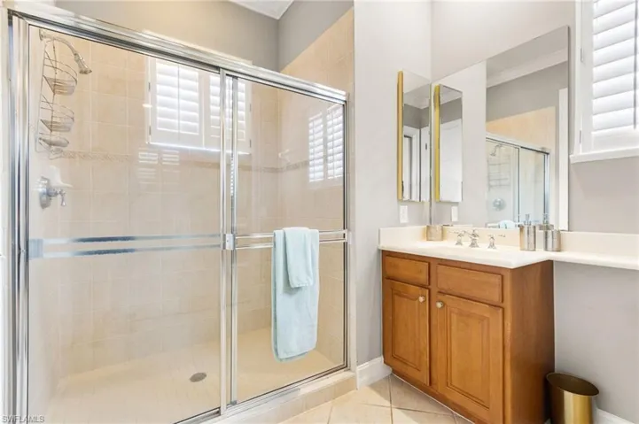 3rd full bath is an ensuite with a walk in shower. Walk in closet.