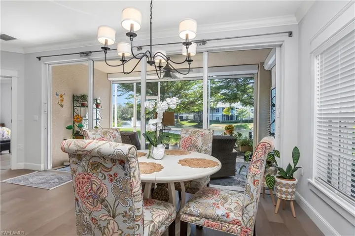 Dining area next to open kitchen.