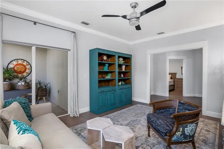 Den showing side lanai.