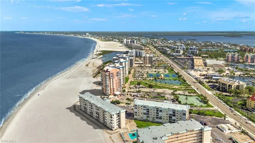 View of urban area with expansive beach