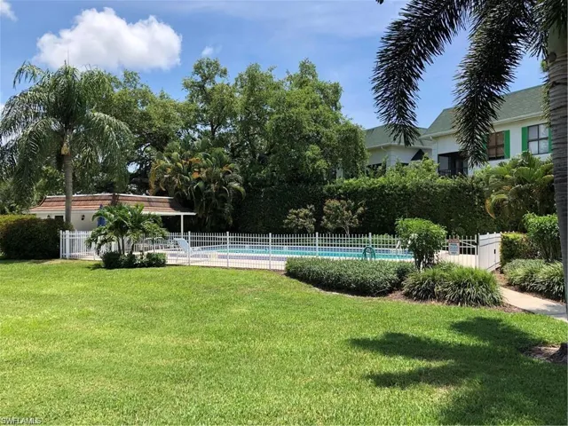 View of yard featuring a community pool