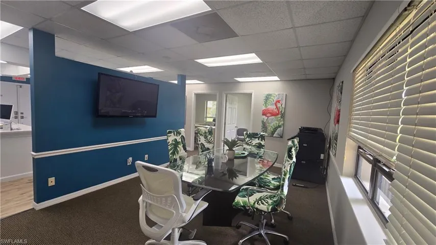 Office area featuring a drop ceiling