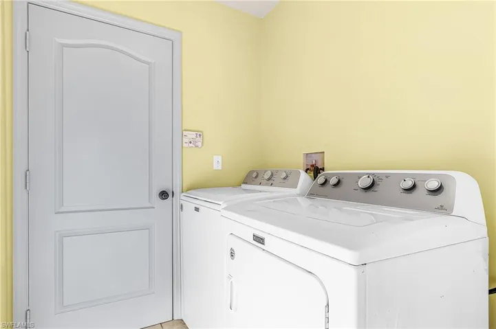 Laundry room with washer and dryer