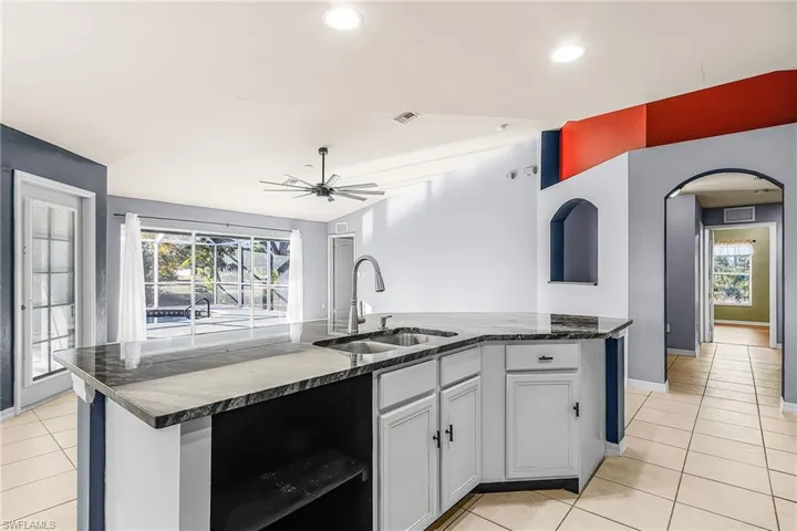 Kitchen featuring island