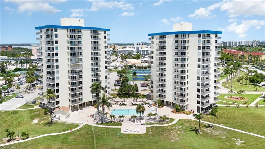 View of property featuring a community pool