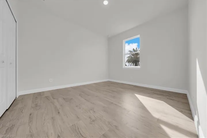 High Ceilings and Palm Tree Views