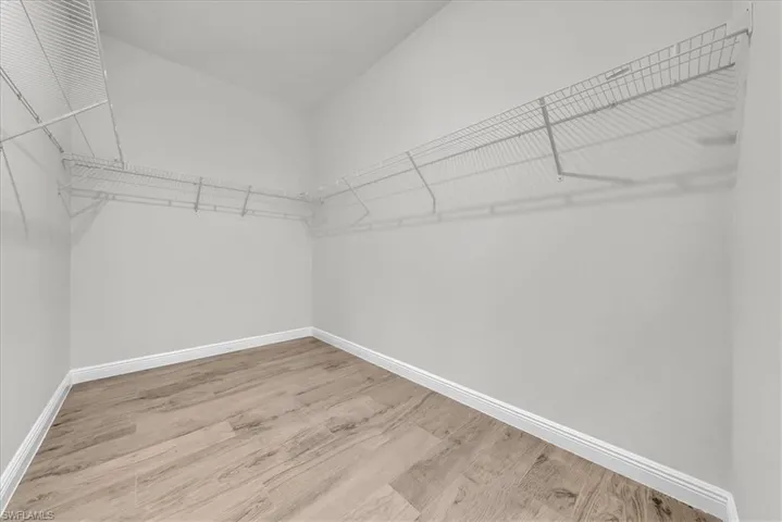 Ample Walk-In Closet Space with Room for Additional Storage