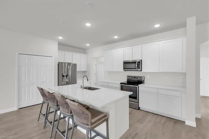 Quartz Counters and Stainless Appliances