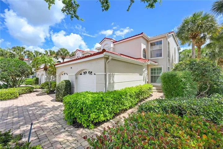 End Unit with attached 1 car garage and driveway