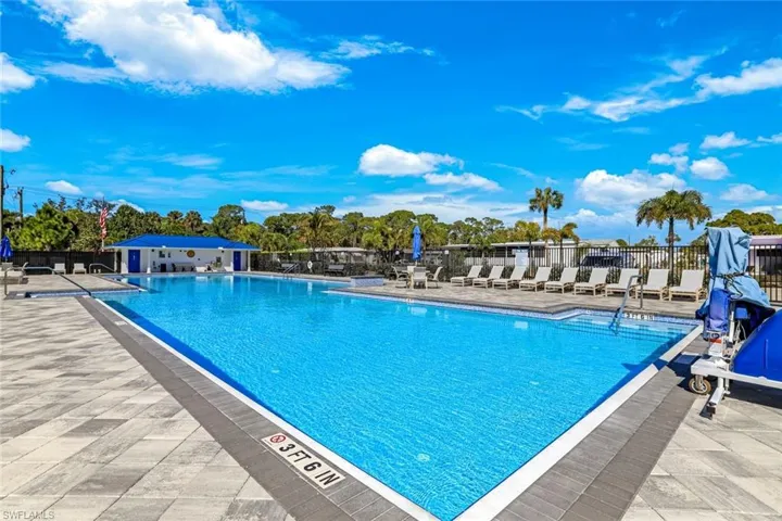 Community pool featuring a patio area