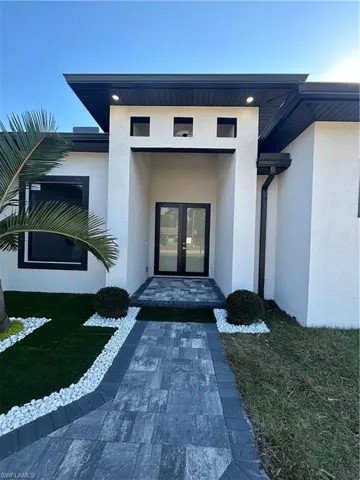 Entrance to property with french doors