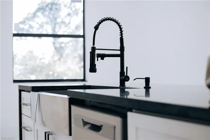 Room details with white cabinetry