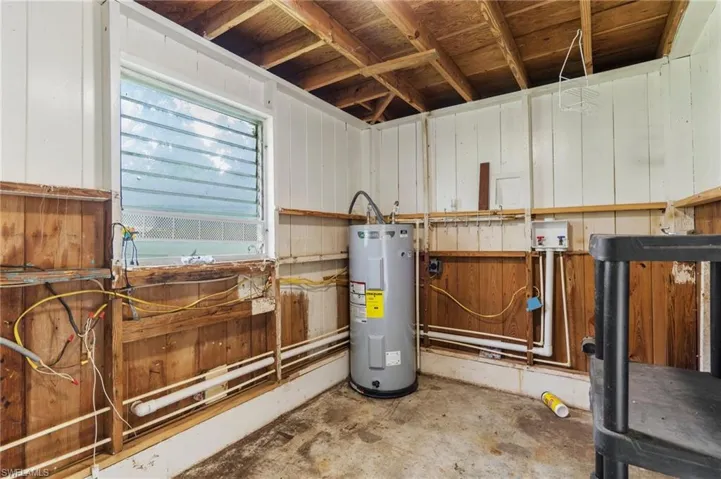 Utility room with electric water heater