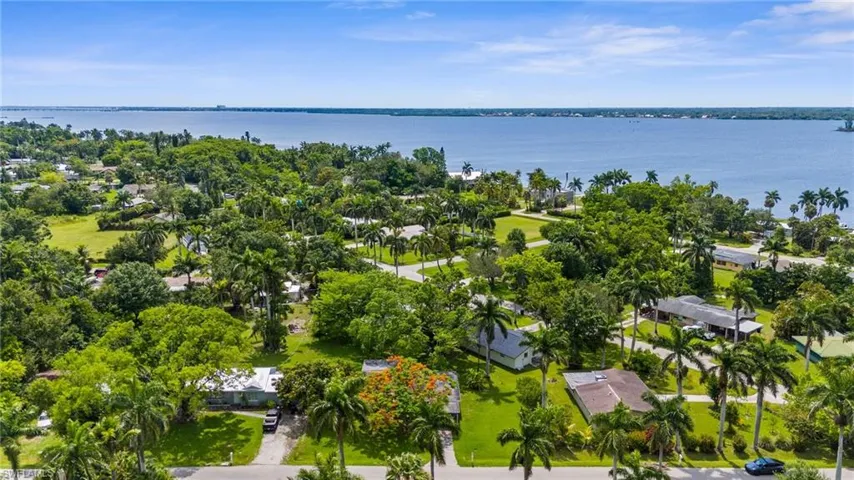 Aerial view of residential area with a nearby body of water