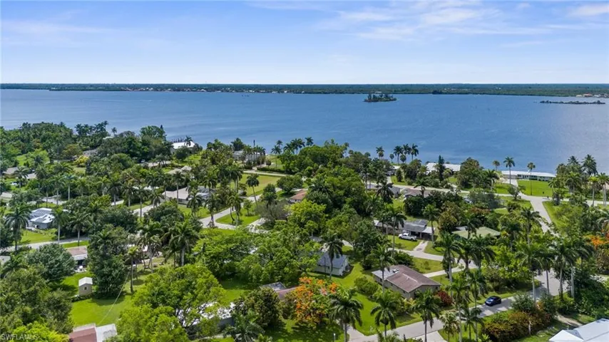 Aerial view of residential area with a nearby body of water