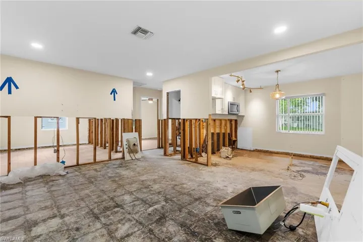 Unfurnished room with recessed lighting