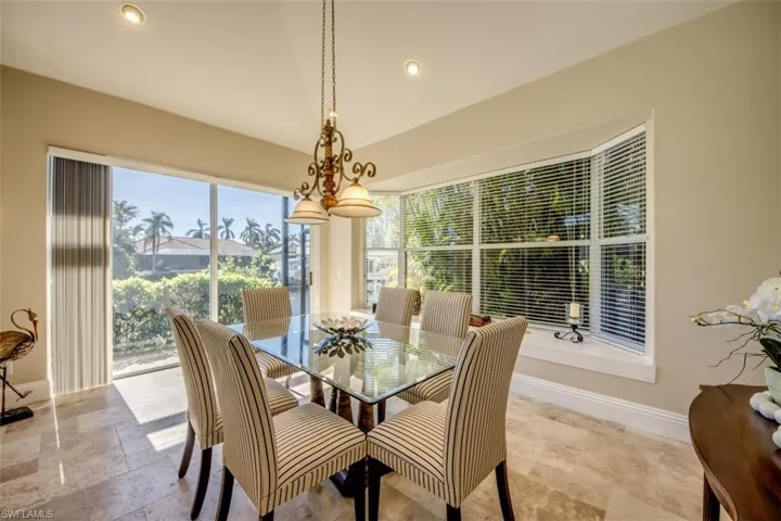 Dining area featuring a notable chandelier