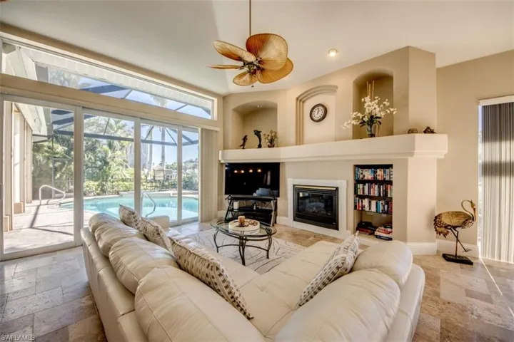 Living room featuring ceiling fan