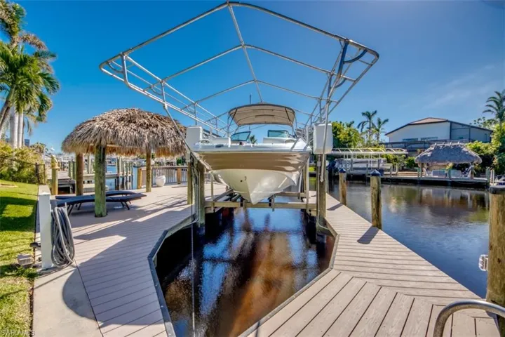 View of dock with a water view