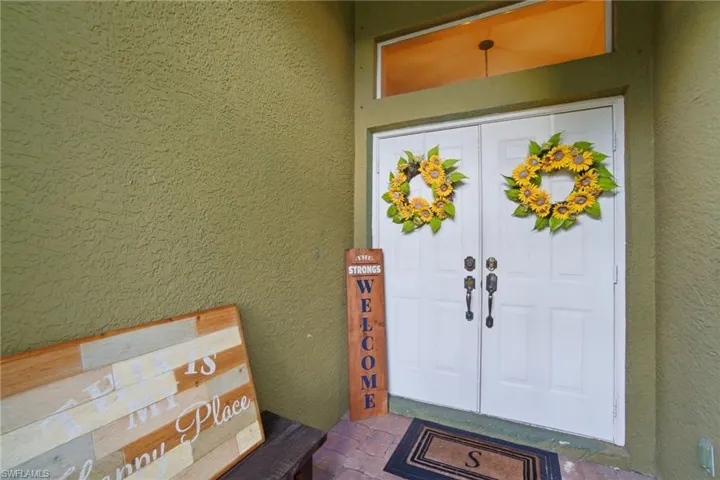 Entryway porch, screened-in and perfect for relaxing!