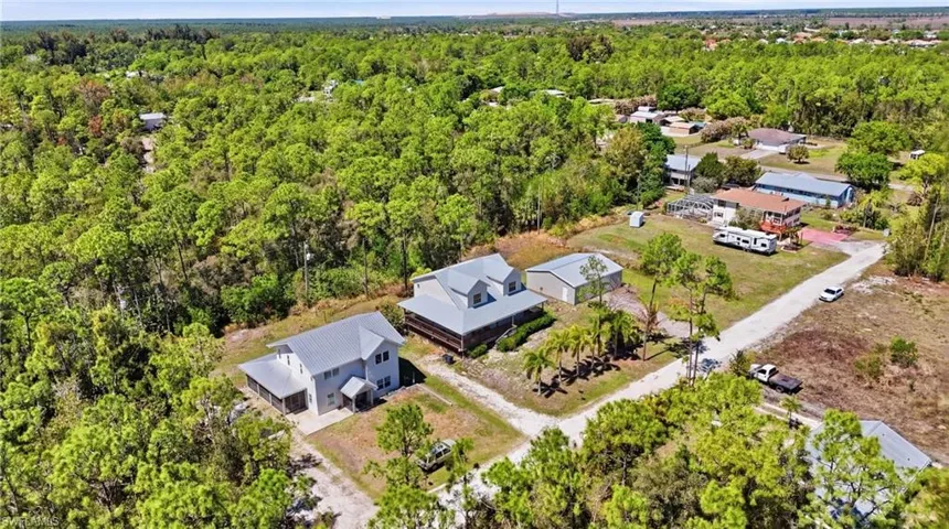 Drone / aerial view of a heavily wooded area