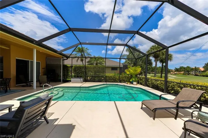 View of pool featuring a patio and a lanai