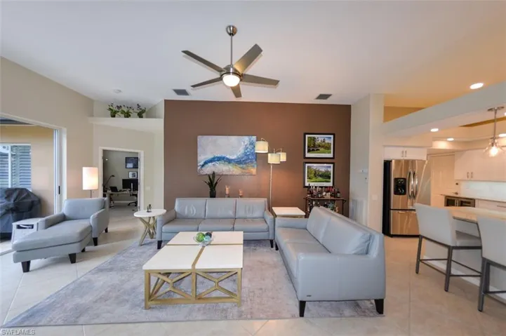 Tiled living room with ceiling fan