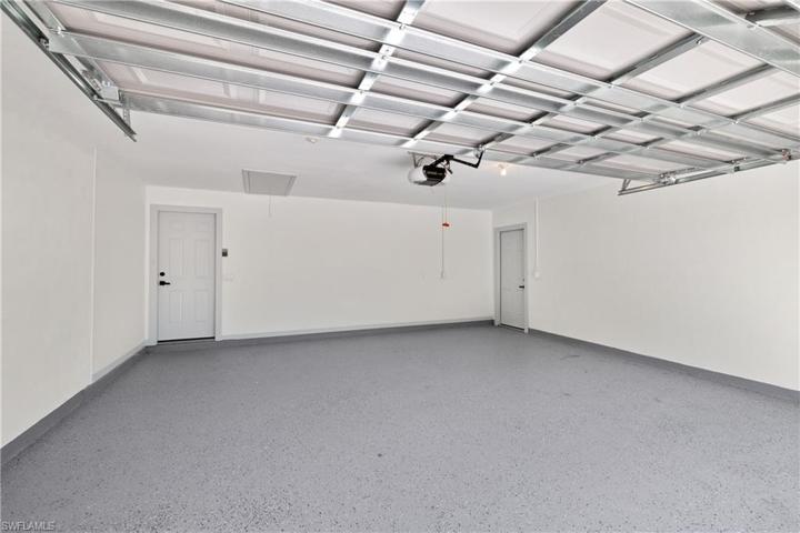 BRAND NEW EPOXY FLOORS IN GARAGE + SIDE DOOR. GARAGE DOOR OPENER + KEY PAD ACCESS.