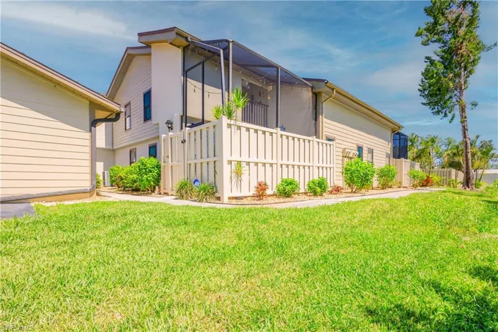 Lanai is enclosed by tall fencing and gate
