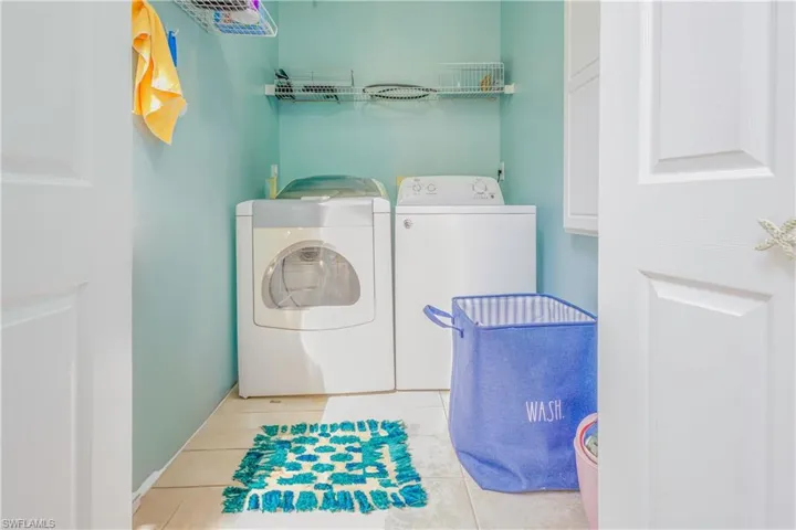 Laundry room off loft upstairs.
