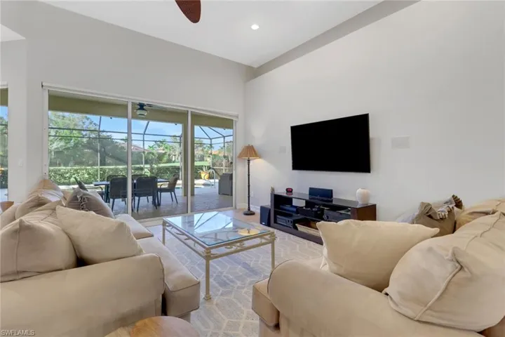 Living room featuring ceiling fan