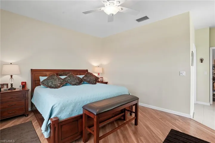 Bedroom featuring light wood-type flooring and ceiling fan