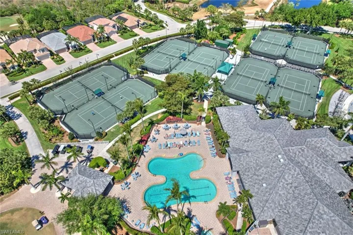 Aerial overview of main fitness center, pool and 8 clay tennis courts