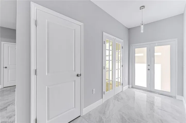 Doorway featuring french doors