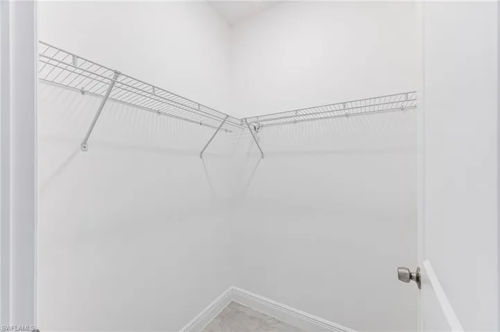 Walk in closet featuring tile patterned floors