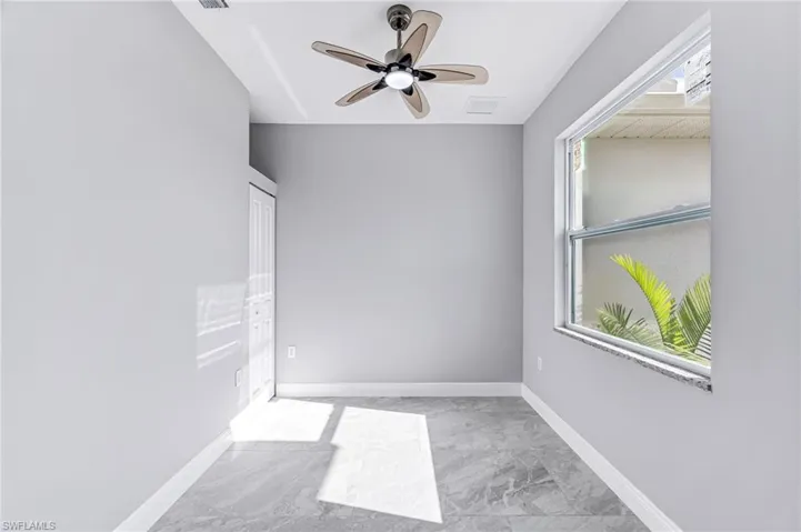 Unfurnished room with ceiling fan