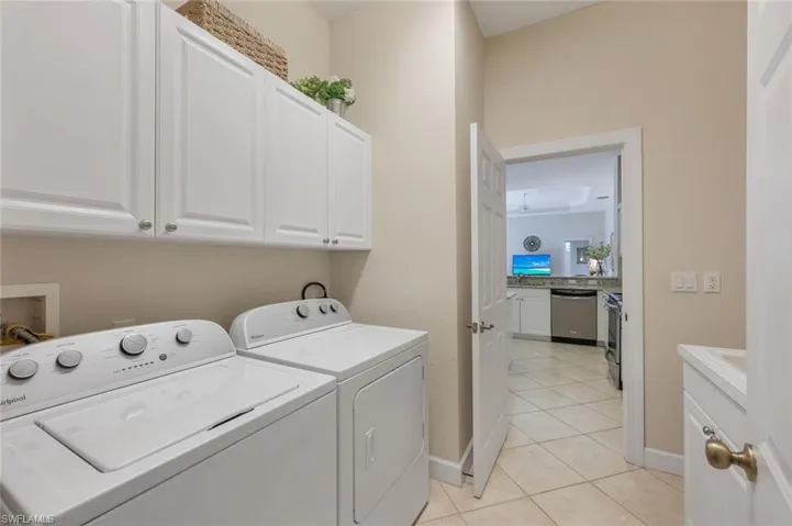 Laundry Room with ample storage and utility sink