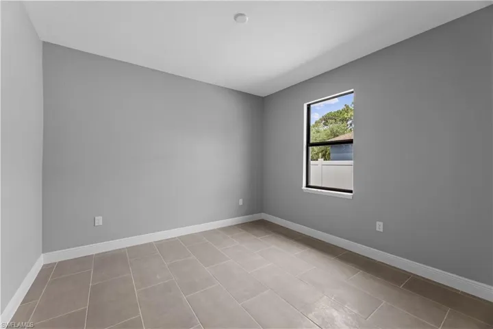 View of tiled spare room