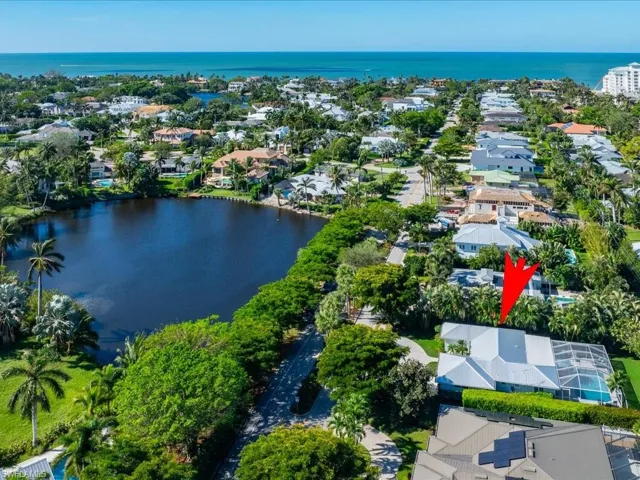 Welcome home to Olde Naples, just footsteps to the beach