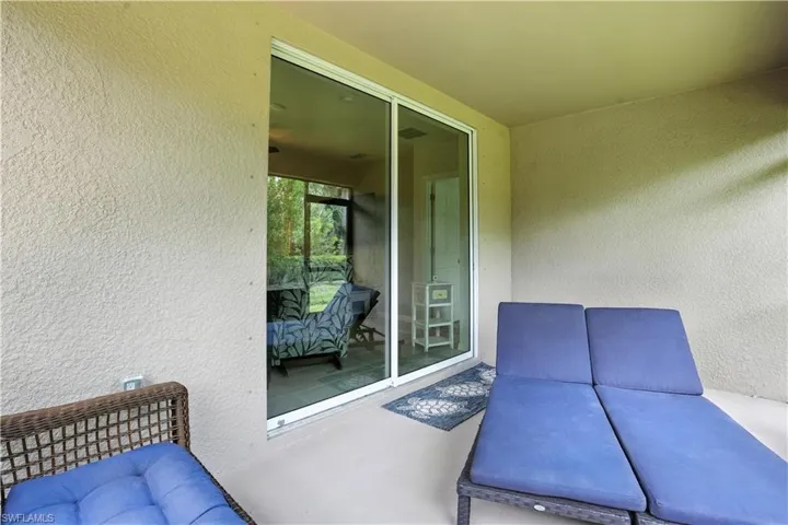 View of screened in  lanai sliding doors