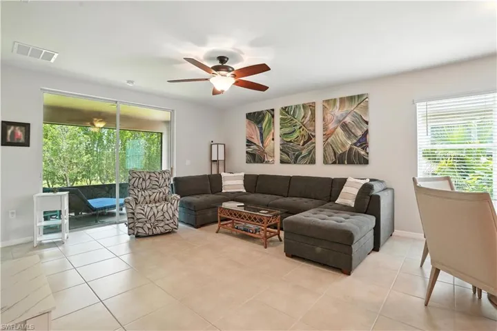 Dining area featuring baseboards and light tile patterned floors