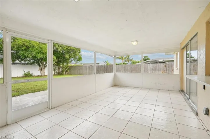 Unfurnished sunroom with plenty of natural light
