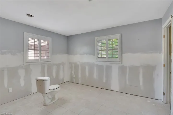 Spare room with light tile flooring