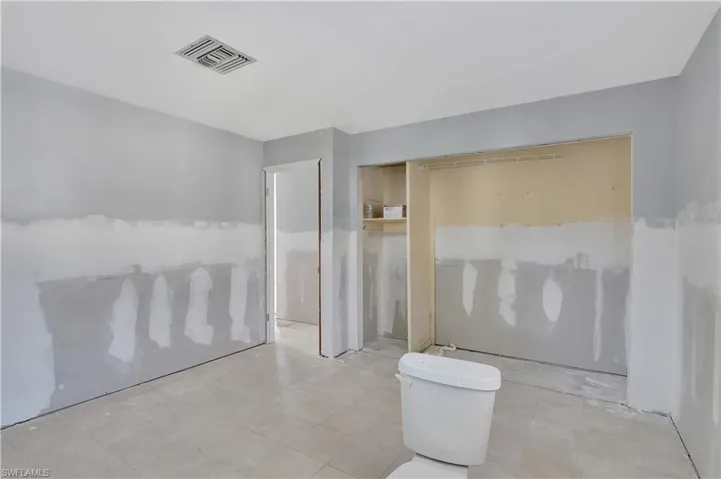 Bathroom featuring tile floors