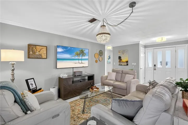 Couch, love seat, chair, TV, tables