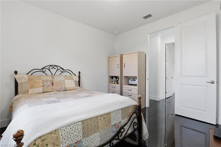 This secondary bedroom has it's own bathroom