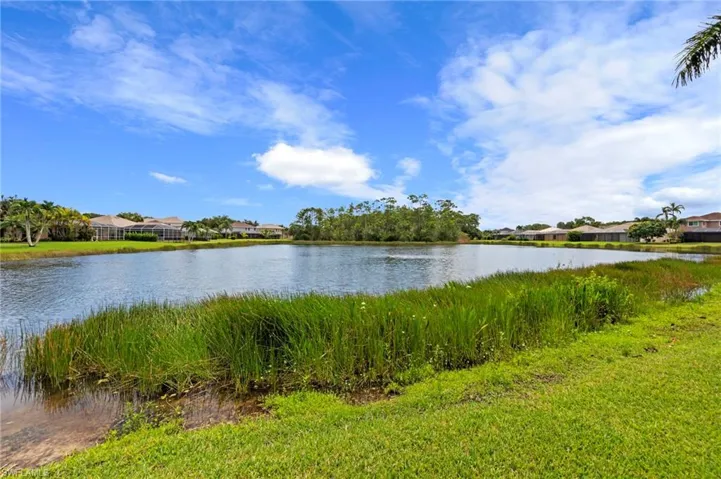 Water view with nearby suburban area