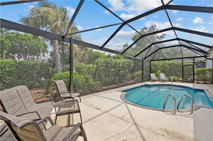 View of pool featuring a lanai and a patio